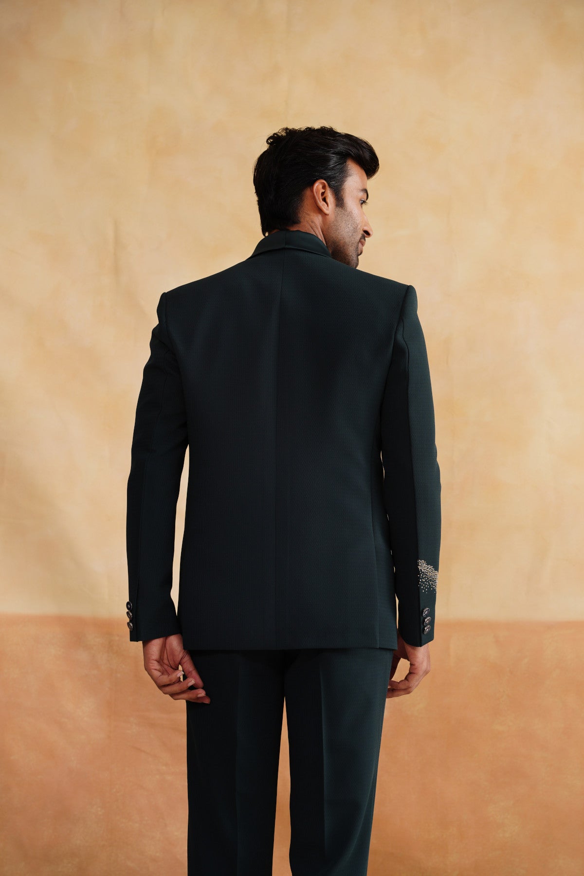 Bottle Green Tuxedo Suit with Gold Bird Flight Embroidery & Stardust Hem