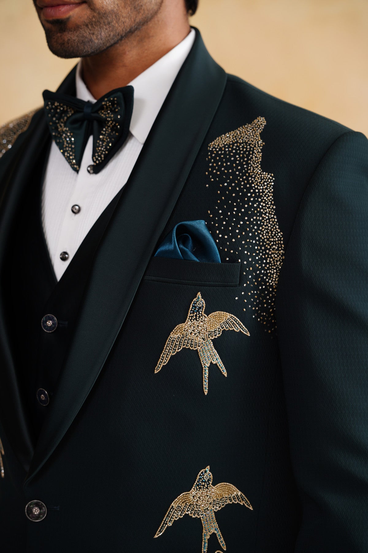 Bottle Green Tuxedo Suit with Gold Bird Flight Embroidery & Stardust Hem