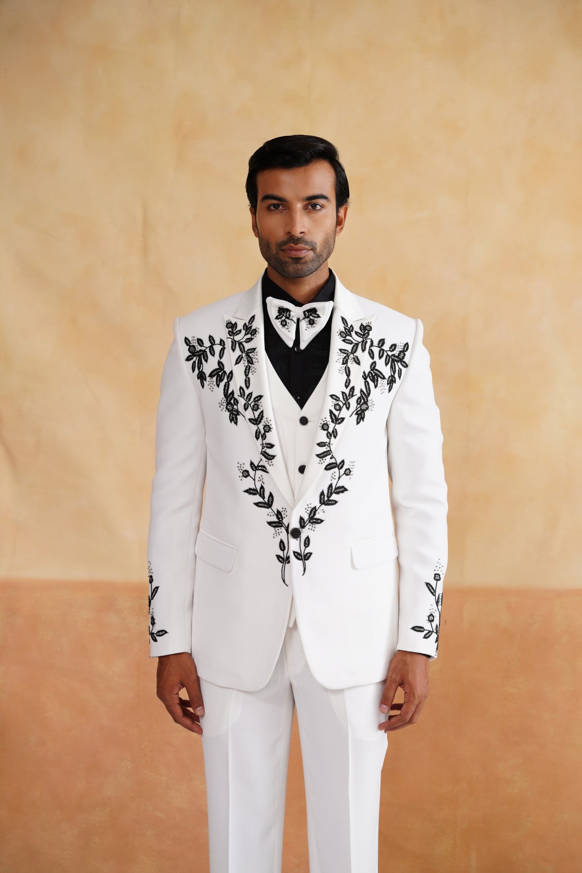 White Tuxedo with High-Contrast Black Botanical Embroidery