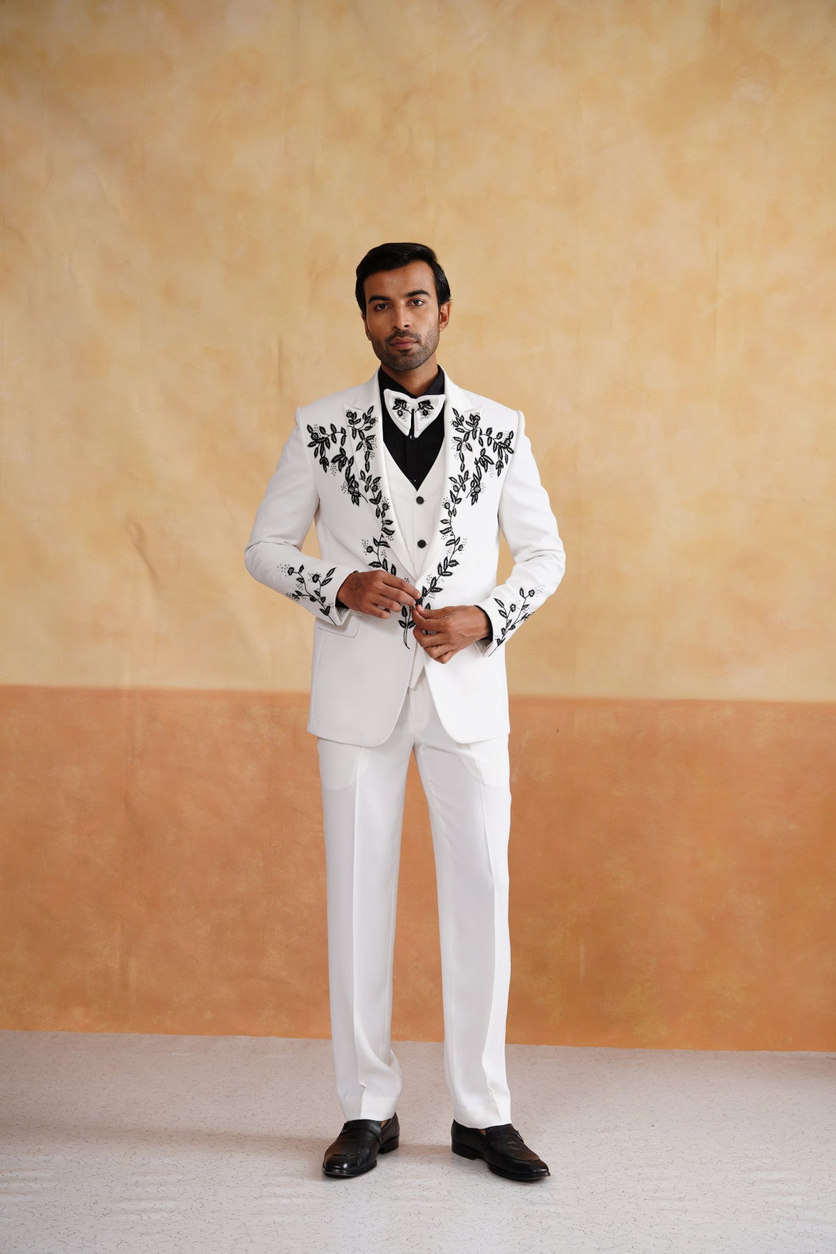 White Tuxedo with High-Contrast Black Botanical Embroidery