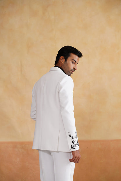 White Tuxedo with High-Contrast Black Botanical Embroidery