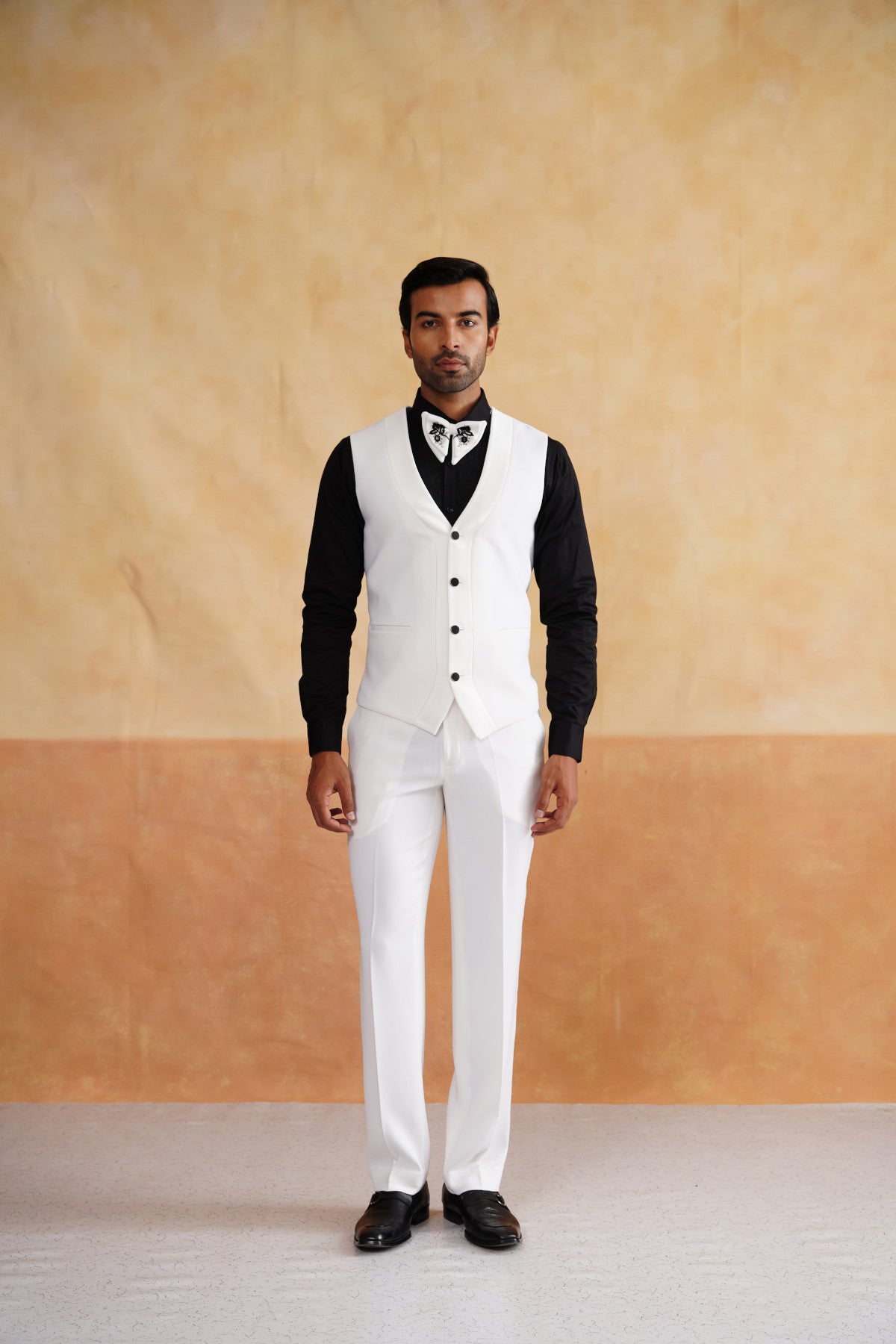 White Tuxedo with High-Contrast Black Botanical Embroidery