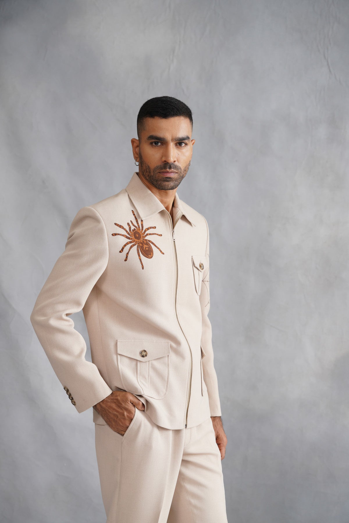 Beige Zip-Up Jacket Set with Statement Spider Motif